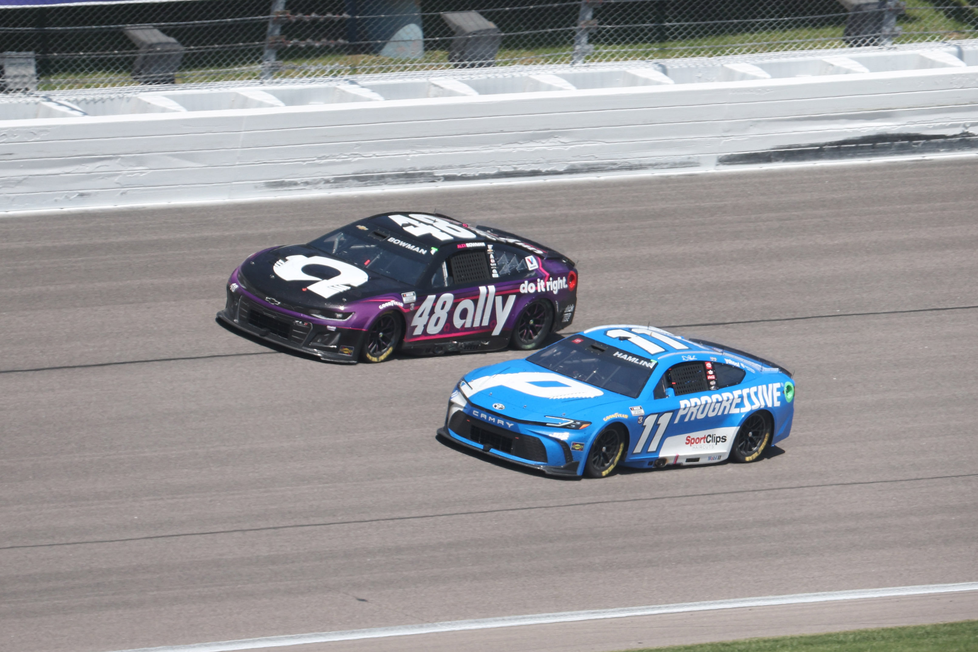 Alex Bowman (#48) alongside Denny Hamlin (#11) at Kansas Speedway - Source: Imagn